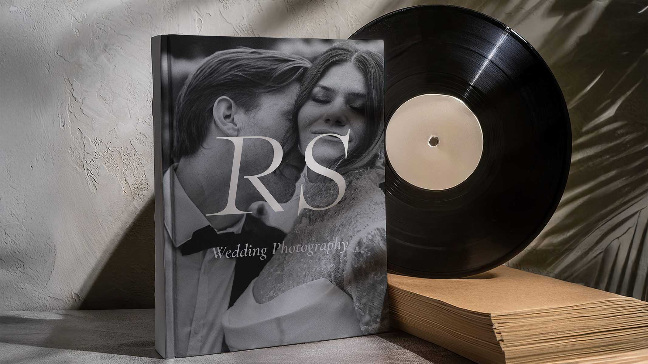 Ricky Sando Photography book staged on a desk with a record.